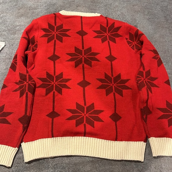 Bright Red Crewneck Sweater with Snowflake Design and White Text - Picture 2 of 2